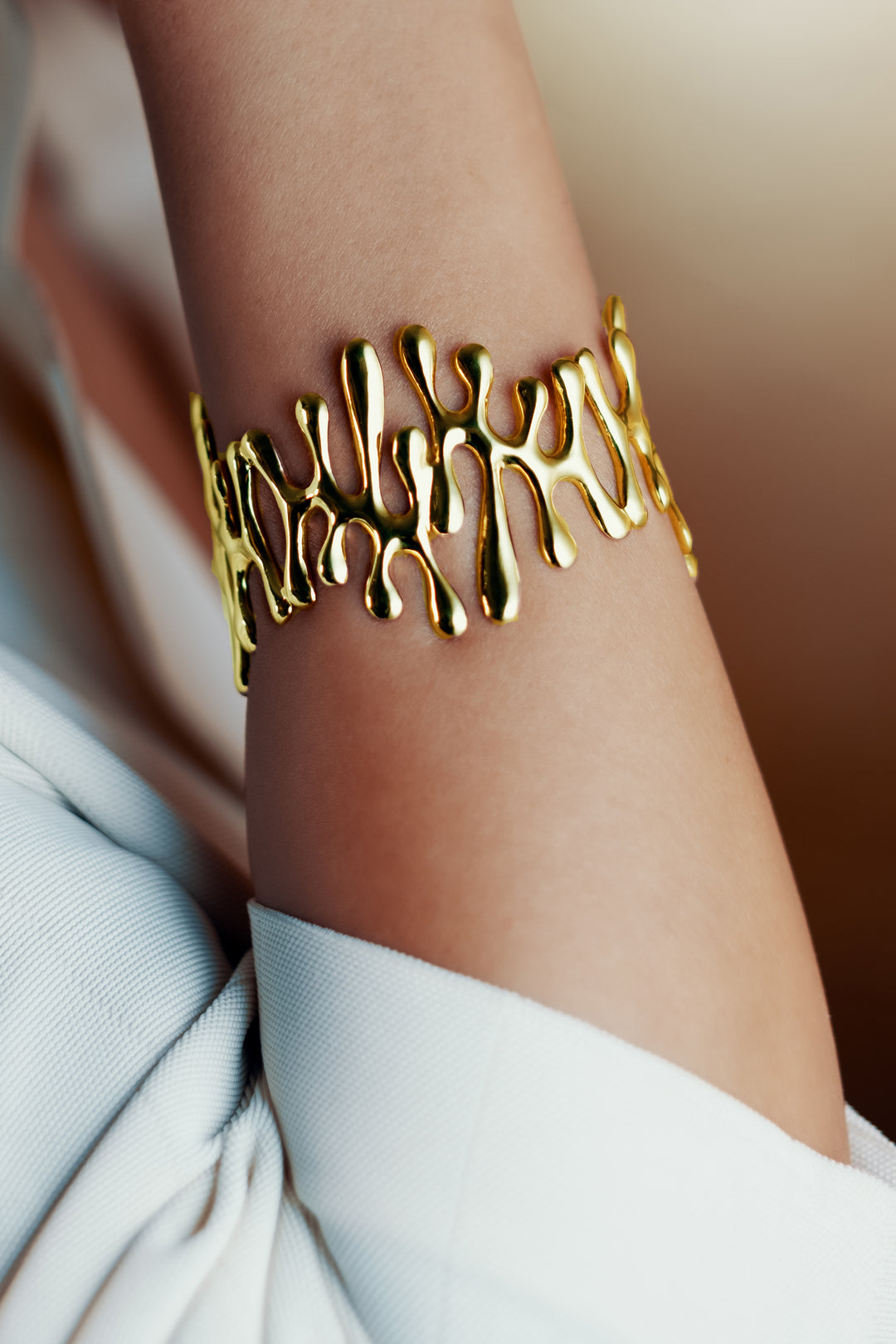 Gold statement cuff bracelet from Atelier ORMAN