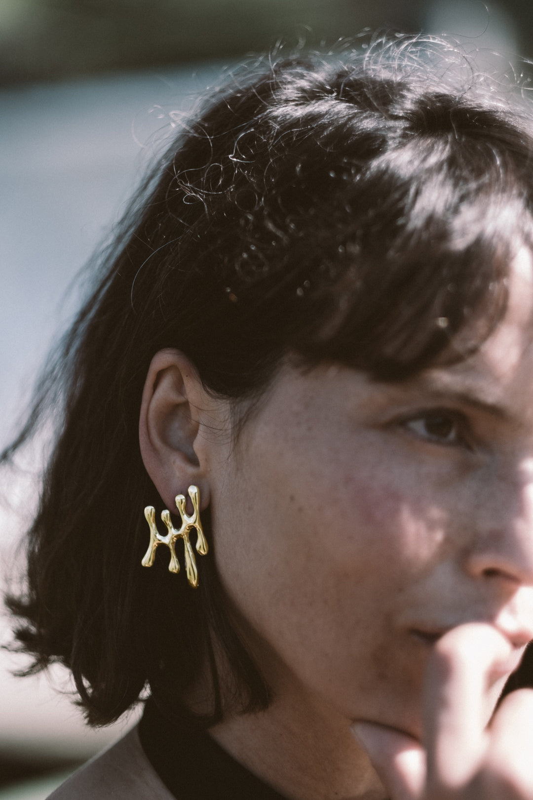 Gold statement pendant earrings from Atelier ORMAN