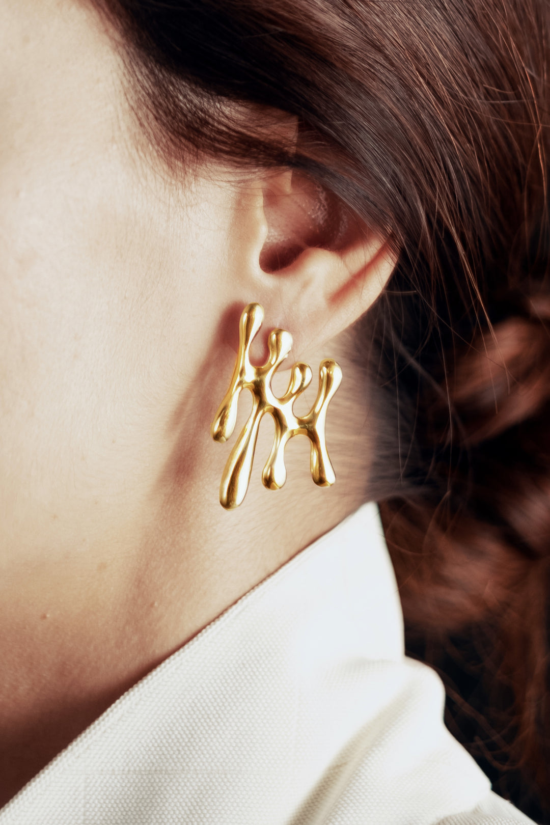 Gold statement pendant earrings from Atelier ORMAN