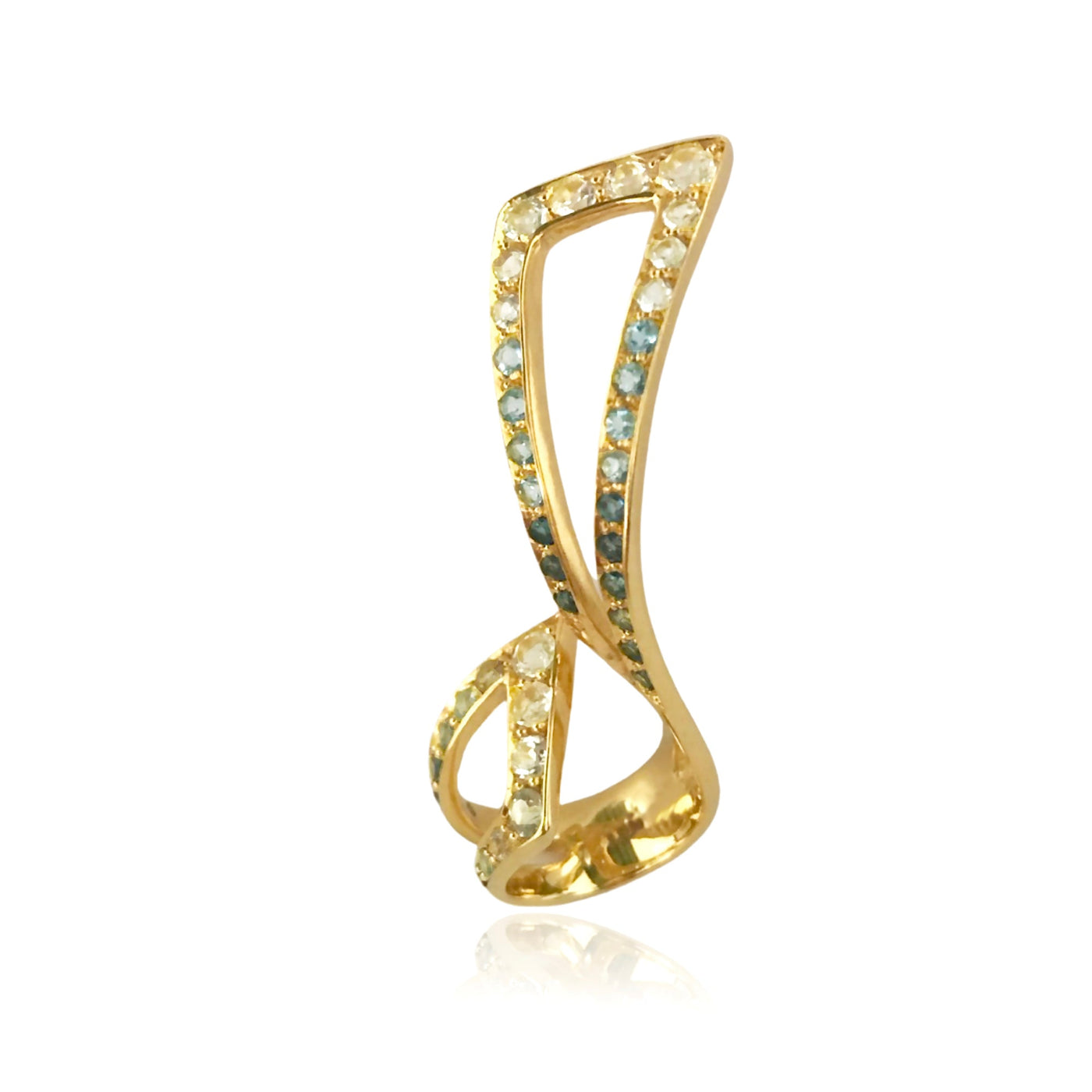 Gold sculptural cocktail ring with blue and white topaz from Atelier ORMAN