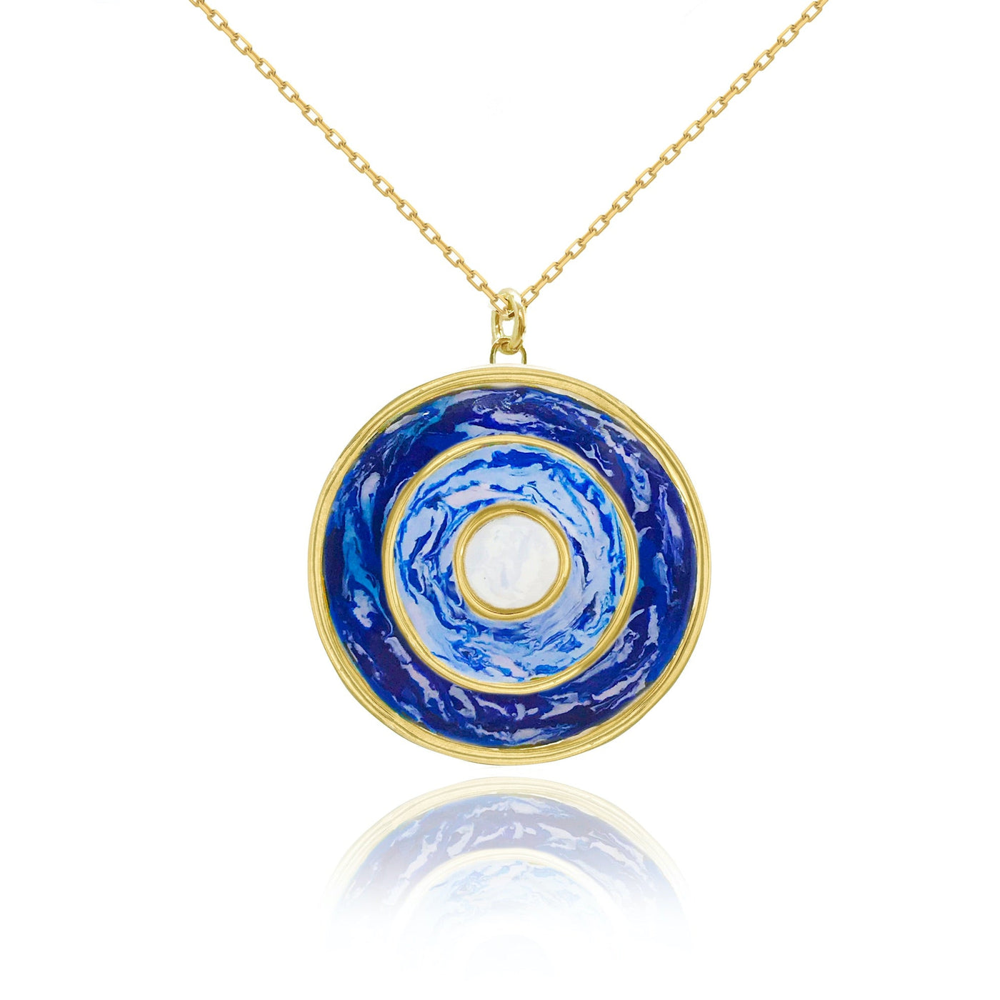 Gold round pendant necklace with blue marbled enamel work from Atelier ORMAN
