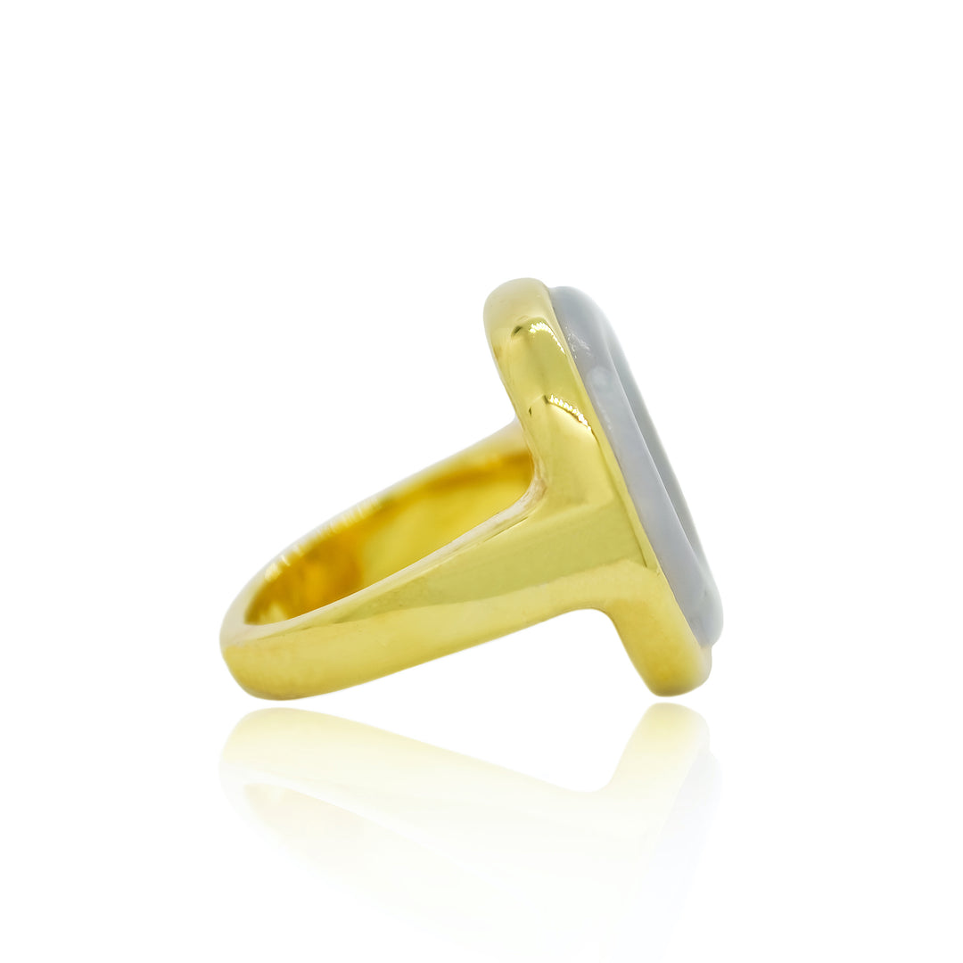 Gold cocktail ring with hand carved chalcedony and amethyst from Atelier ORMAN