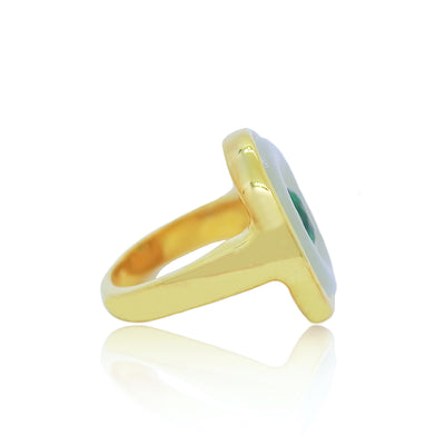 Gold round cocktail ring with hand carved aventurine and peridot from Atelier ORMAN