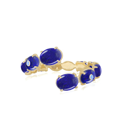 fine jewelry cuff bracelet in gold with blue lapis lazuli and blue aquamarine gemstones from Atelier ORMAN