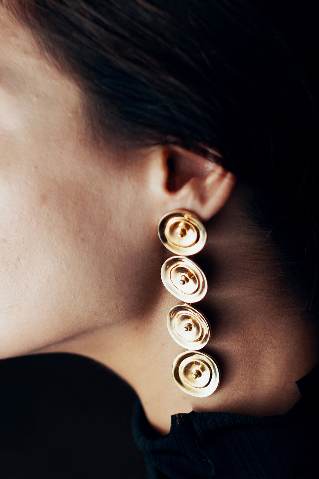 Gold pendant earrings from Atelier ORMAN